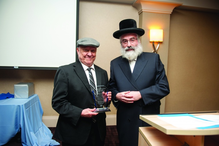 Rabbi Sholom H. Adler Presenting A Lifetime Achievement In Kashrut Award To Cor Rabbinic Field Representative Rabbi Zev Eisenstein Title Image